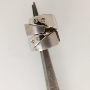 Estate Diamond Earrings 
14 Karat White Estate Diamond Earrings 
Gram Weight 7.13 
4 Center Diamonds Shape: Round; Clarity: SI1; Colour: H 0.05