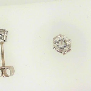 Estate Diamond Earrings 
18 Karat White Estate Diamond Earrings 
Gram Weight 0.6 
2 Center Diamonds Shape: Round; Clarity: I2; Colour: J/K 0.45