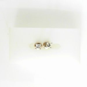 Estate Diamond Earrings Screw Back
14 Karat White Estate Diamond Earrings 
Gram Weight 0.66 
2 Center Diamonds Shape: Princess; Clarity: I2; Colour: I/J 0.25