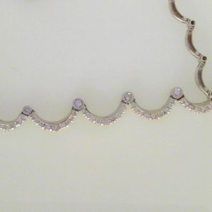 Diamond Pendant/Necklace 
18 Karat White Diamond Pendant 
Gram Weight 19.84 Chain Style: Scalloped 18 Karat White Length: 17in 
87 Center Diamonds Shape: Round 3.01