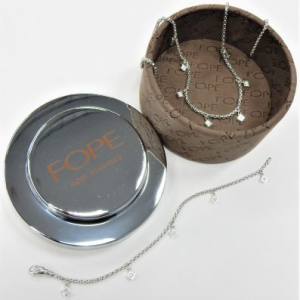 Fope Estate Diamond Pendant/Necklace 
 Estate Diamond Pendant 
Gram Weight 32.9 Chain Style: Station 18 Karat White 16.5 
7 Center Diamonds Shape: Round; Clarity: VS; Colour: F/G With 5 Round Diamonds