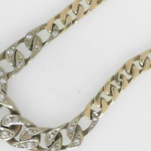 Estate Diamond Pendant/Necklace 
 Estate Diamond Pendant 
Gram Weight 21.93 Chain Style: Curb 14 Karat Yellow/White 16 
24 Center Diamonds Shape: Round