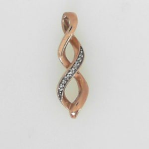 Estate Diamond Pendant/Necklace 
10 Karat Rosé Estate Diamond Pendant 
Gram Weight 1.36 Chain Style: No Chain 
11 Center Diamonds Shape: Round