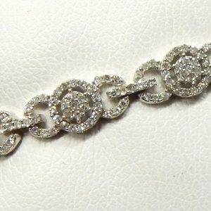 Estate Diamond Bracelet 
14 Karat White Estate Diamond Bracelet Length: 7in 
Gram Weight 8.6 
580 Center Diamonds Shape: Round; Clarity: SI1; Colour: H 1.75