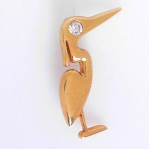 Pelican Estate Pins and Brooches 
14 Karat Yellow Estate Pin/Brooch Gram Weight: 3.5 
1 Diamond 0.125tw Shape: Round Clarity: SI1 Colour: I