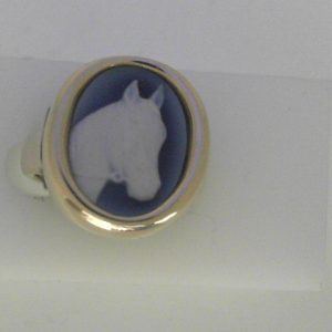 10 Karat Yellow Blue Horse Cameo Ring With Finger Size 6 
Width 3mm