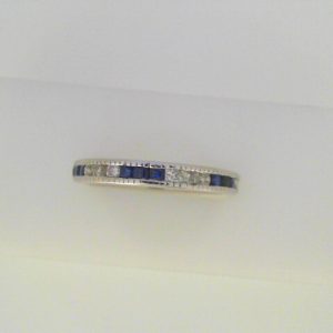 Diamond Ring 
14 Karat White Diamond Ring With Finger Size 7 
 
 Center Diamond Shape: Round Princess Sapphire 0.55 ctw