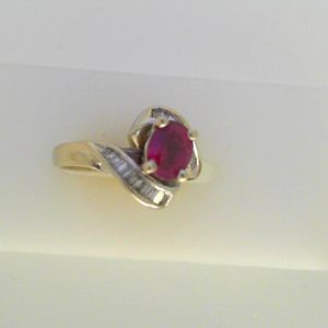 Ruby Estate Ring 
14 Karat White Ruby Ring With Finger Size 4.5 
Width 2.2mm Gram Weight 3.6 
1 Center Ruby 0.66ct Shape: Oval With 24 Baguette Diamonds 0.25 ctw