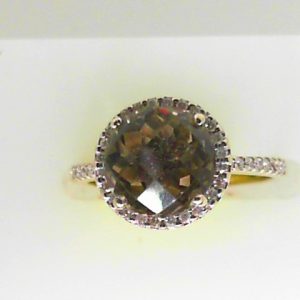 Smokey Quartz Estate Ring 
14 Karat White Smokey Quartz Ring With Finger Size 5.5 
 Gram Weight 2.83 
1 Center Smokey Quartz Shape: Round Round Diamond