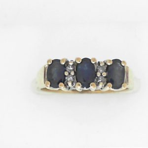 Sapphires Estate Ring 
10 Karat Yellow Sapphires Ring With Finger Size 6 
 Gram Weight 3.01 
3 Center Sapphires Shape: Oval With 4 Round Diamonds