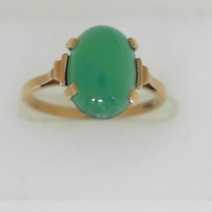 Jade Estate Ring 
18 Karat Yellow Jade Ring With Finger Size 6.5 
 Gram Weight 2.41 
1 Center Jade Shape: Oval