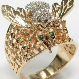 Emeralds Estate Ring 
14 Karat Yellow Emeralds Ring With Finger Size 11.5 
 Gram Weight 15 
2 Center Emeralds Shape: Round With 29 Round Diamonds 0.50 ctw