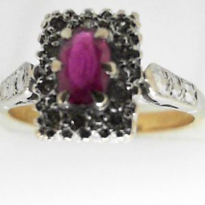 Ruby Estate Ring 
18 Karat Yellow/White Pink Ruby Ring With Finger Size 6 
 Gram Weight 4.2 
1 Center Ruby Shape: Emerald; Colour: Pink With 10 Round Diamonds