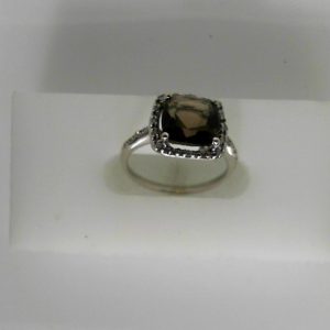 Quartz Estate Ring 
10 Karat White Quartz Ring With Finger Size 4.5 
 Gram Weight 2 
1 Center Quartz Shape: Princess Round Diamond