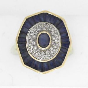Sapphires Estate Ring 
18 Karat Yellow Blue Sapphires Ring With Finger Size 6 
 Gram Weight 5 
28 Center Sapphires Shape: Various Shapes; Colour: Blue With 45 Round Diamonds 0.20 ctw