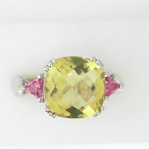 Quartz Estate Ring 
14 Karat White Green Quartz Ring With Finger Size 7.25 
 Gram Weight 3.8 
1 Center Quartz Shape: Cushion; Colour: Green With 2 Trillian Tourmalines