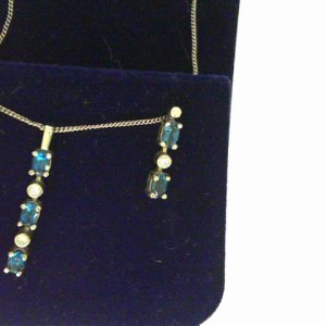 Earrings with Precious Topazes 
14 Karat White Blue Precious Topazes Earrings 
 Gram Weight 2.5 
4 Center Precious Topazes Shape: Oval; Colour: Blue With 2 Round Diamonds 0.05 ctw