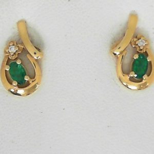 Earrings with Emeralds 
14 Karat Yellow Emeralds Earrings 
 Gram Weight 2.54 
2 Center Emeralds Shape: Oval With 2 Round Diamonds 0.03 ctw