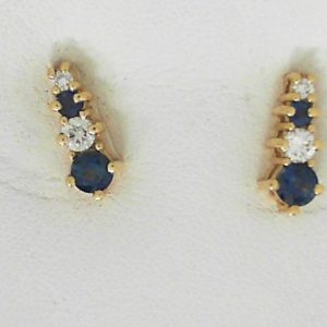 Earrings with Sapphires 
14 Karat Yellow Sapphires Earrings 
 Gram Weight 2.6 
4 Center Sapphires Shape: Round With 4 Round Diamonds 0.30 ctw