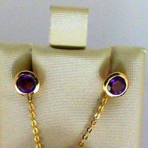 Earrings with Amethysts 
10 Karat Yellow Amethysts Earrings 
 
2 Center Amethysts Shape: Round