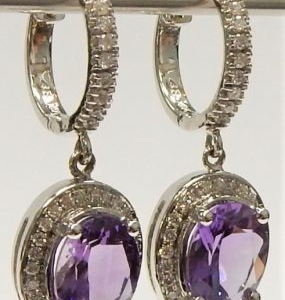 Estate Earrings With Diamonds 
14 Karat White H Diamonds Earrings 
 Gram Weight 6.7 
76 Center Diamonds Shape: Round; Clarity: SI-I1; Colour: H With 2 Round Amethysts 3.00 ctw