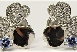 Tiffany & Co. Estate Earrings With Tanzanites 
Platinum White Tanzanites Earrings 
 Gram Weight 4.8 
4 Center Tanzanites Shape: Round With 40 Round Diamonds