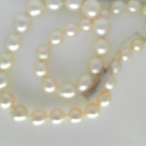 Pearl Pendant 
 White Pearl Pendant 
 Chain Style: No Chain 14 Karat White Length: 16in 
 Center Pearl Shape: Baroque; Colour: White