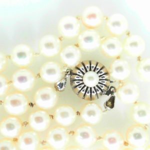 Pearls Estate Pendant 
14 Karat Yellow White Pearls Pendant 
 Chain Style: No Chain Length: 19in 
64 Center Pearls Shape: Round; Colour: White