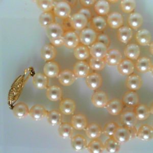 Pearls Estate Pendant 
14 Karat Yellow Pearls Pendant 
 Length: 24in 
73 Center Pearls Shape: Round