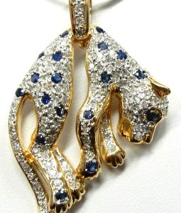 Diamonds Estate Pendant 
14 Karat Yellow Diamonds Pendant 
Gram Weight 11.6 Chain Style: No Chain 
50 Center Diamonds Shape: Round With 19 Round Sapphires 0.75 ctw