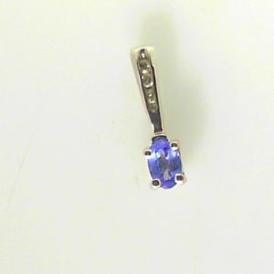 Tanzanite Estate Pendant 
14 Karat White Tanzanite Pendant 
Gram Weight 0.99 Chain Style: No Chain 
1 Center Tanzanite Shape: Oval With 3 Round Diamonds