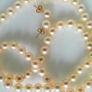 Pearls Estate Pendant and Earring Set
14 Karat Yellow Cream Pearls Pendant 
 Chain Style: Bead 14 Karat Yellow Length: 18in 
66 Center Pearls Shape: Round; Colour: Cream
