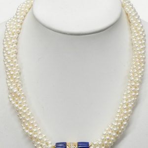 Pearls Estate Pendant 
14 Karat Yellow Pearls Pendant 
Gram Weight 66.5 Chain Style: Bead 14 Karat Yellow Length: 17in 
100 Center Pearls Shape: Round With 1 Various Shapes Lapis and 18 Round Diamonds