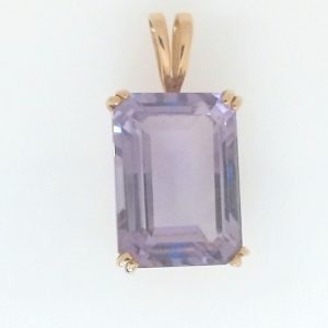 Amethyst Estate Pendant 
14 Karat Yellow Violet Amethyst Pendant 
Gram Weight 5.51 Chain Style: No Chain 14 Karat 
1 Center Amethyst 16.68ct Shape: Emerald; Colour: Violet