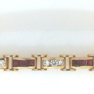 Estate Bracelet With Rubies 
18 Karat Yellow Red Rubies Bracelet Length: 6.75in to 7.25in
Gram Weight 35.2 
21 Center Rubies Shape: Princess; Colour: Red With 21 Round Diamonds 2.50 ctw
With extra "link" that has been converted into a pendant