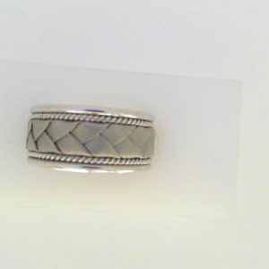 White 10 Karat Satin Band Ring Width 9 mm 
Size: 6.5 
Gram Weight 6.58 gr