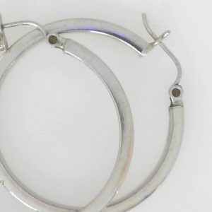 White 14 Karat Polished Medium Hoop Estate Earring 
Gram Weight 3.36 gr 
Length 1.25 mm