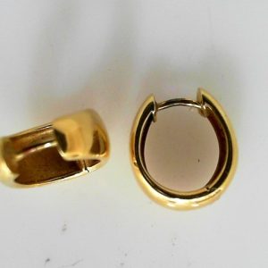 6.4 grams 14 karat Huggie style hoop earrings.