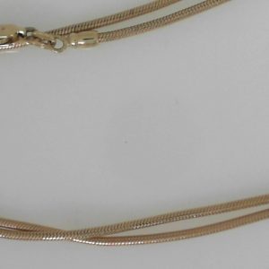 Yellow 14 Karat Polished Snake Estate Chain 
Length 18 in 
Gram Weight 10.79 gr