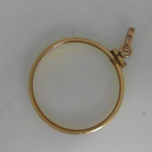 Estate Coin Mount for Canadian Maple
14 Karat Yellow Pendant/Charm
Gram Weight 2.33 Chain Style: No Chain 14 Karat