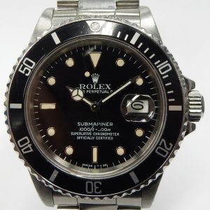Estate Rolex Divers Year: 1987
Vendor Style #: 16800 Submariner SN: 9,485,768 Oyster
40mm StainlessSteel
Dial: Black plots 
Box Not Included/Papers Not Included
Condition Good
1 Year Warranty