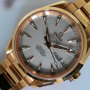 Estate Omega Dress 
Vendor Style #: 231.50.39.22.02.001 Aquaterra Annual Calendar SN: 86286393 
39mm 18 Karat
Dial: Silver arrowhead 
Box Included/Papers Not Included
Condition Very good
1 Year Warranty