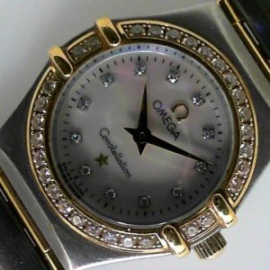 Estate Omega Dress Year: 2005
Vendor Style #: 1267.75.00 Constellation MOP dia dia SN: 59245101 
22.5mm 18K/Stainless Steel
Dial: MOP diamond 
Box Included/Papers Included
Condition Very good
1 Year Warranty