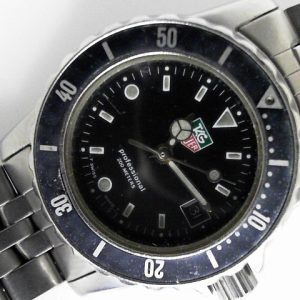 Estate Tag Heuer Divers 
Vendor Style #: 929.208G 1500 black black SN: K54840 
28.3mmmm StainlessSteel
Dial: Black plots 
Box Not Included/Papers Not Included
Condition Fair
1 Year Warranty