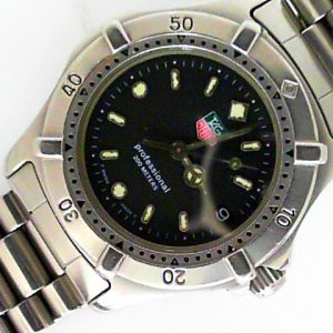 Estate Tag Heuer Dress 
Vendor Style #: WE1210-R 2000 classic SN: H64726 
33.5mm StainlessSteel
Dial: black 
Box Not Included/Papers Not Included
Condition fair
1 Year Warranty