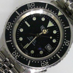 Estate Tag Heuer Divers 
Vendor Style #: 980.023 SN: 6034 W100 
41mmmm StainlessSteel
Dial: Black plots 
Box Not Included/Papers Not Included
Condition Good
1 Year Warranty