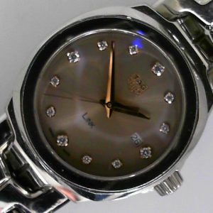 Estate Tag Heuer Dress 
Vendor Style #: WBC131E-0 Link SN: WTE5059 
32mm StainlessSteel
Dial: Taupe Rose diamond 
Box Included/Papers Included
Condition Excellent
1 Year Warranty