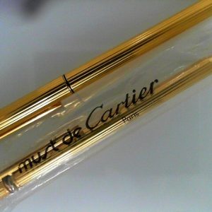 Gold plate Cartier Roller Ball pen and Ballpoint with 18k nib. Orginal inner  boxes, paper work, and extra ink for ball point.  Roller ball ink dry.