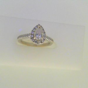 Diamond Engagement Ring 
14 Karat White Engagement Ring 0.7twt
Finger Size 3.25 
1 Center Diamond 0.43ct Shape: Pear Clarity: I1 Colour: F With 37 Round Diamonds 0.27 ctw 0.7