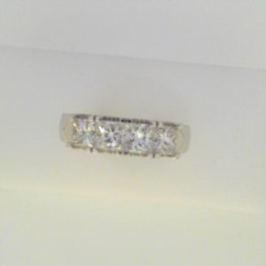 Diamond Engagement Ring 
18 Karat White Engagement Ring 1.05twt
Finger Size 6 
 Center Diamond Shape: Princess Clarity: SI2 Colour: G/H 1.05